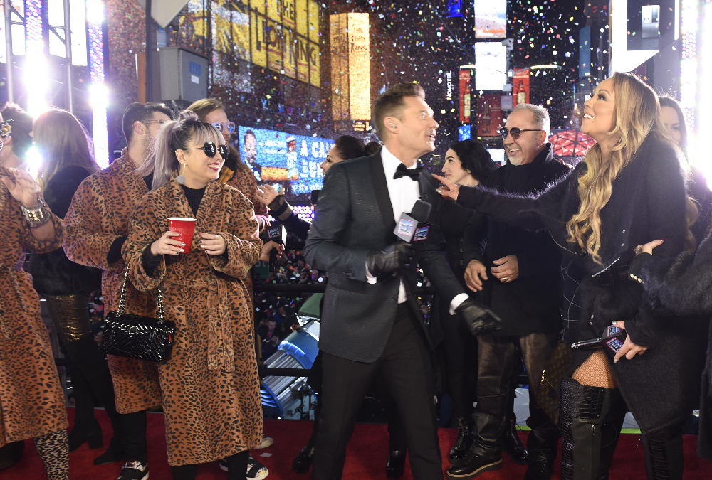 Ryan Seacrest (center) and Mariah Carey (far right) on "Dick Clark's New Year's Rockin' Eve with Ryan Seacrest 2017"