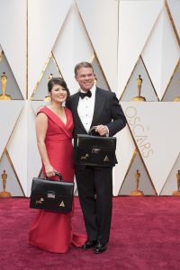 PriceWaterHouse Coopers employee Brian Cullinan (pictured at right) on the Oscar red carpet before the show at the Dolby Theatre on February 26, 2017.